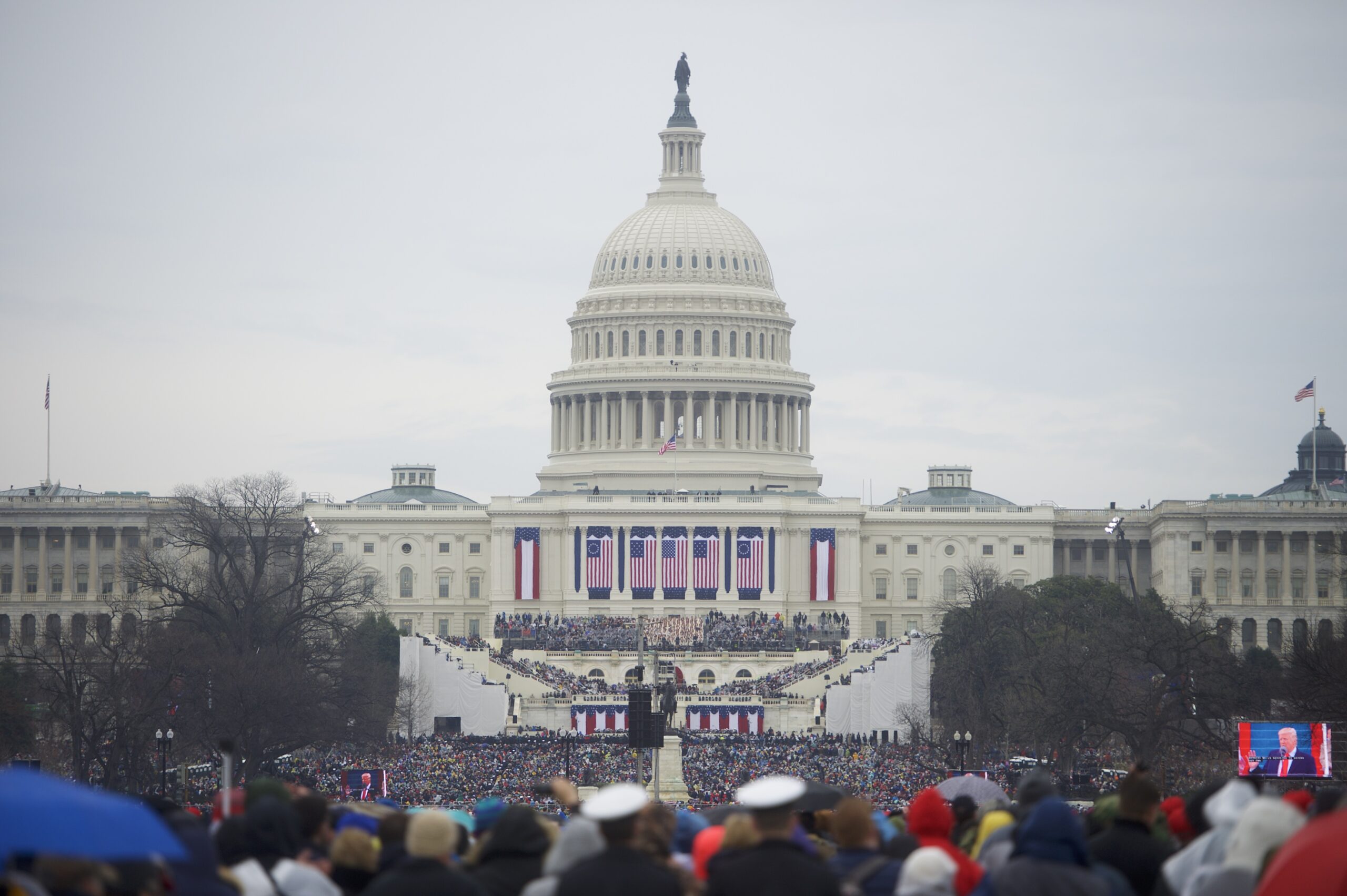 WASHINGTON, DC - JANUARY 20:  Supporters arrive before the inauguration of Donald Trump being sworn in as the 45th President of the United States in front of the U.S. Capitol Building on the National Mall January 20, 2017 in Washington D.C.  Hundreds of thousands of people attended to celebrate and protest.  (Photo by Mark Makela/Getty Images)