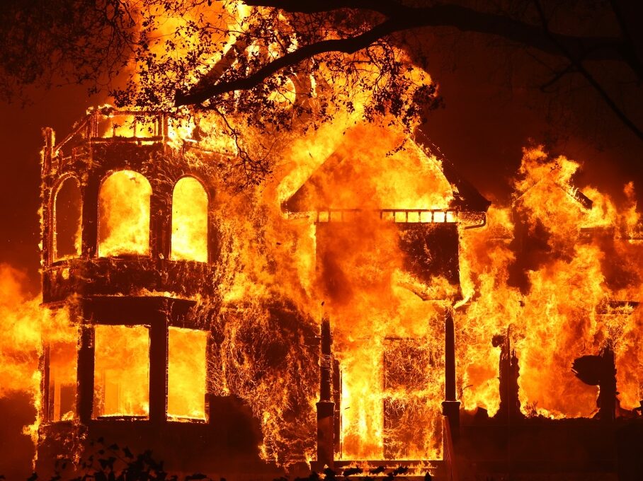 ST. HELENA, CALIFORNIA - SEPTEMBER 27: The Glass Mountain Inn burns as the Glass Fire moves through the area on September 27, 2020 in St. Helena, California. The fast moving Glass fire has burned over 1,000 acres and has destroyed homes. Much of Northern California is under a red flag warning for high fire danger through Monday evening. (Photo by Justin Sullivan/Getty Images)